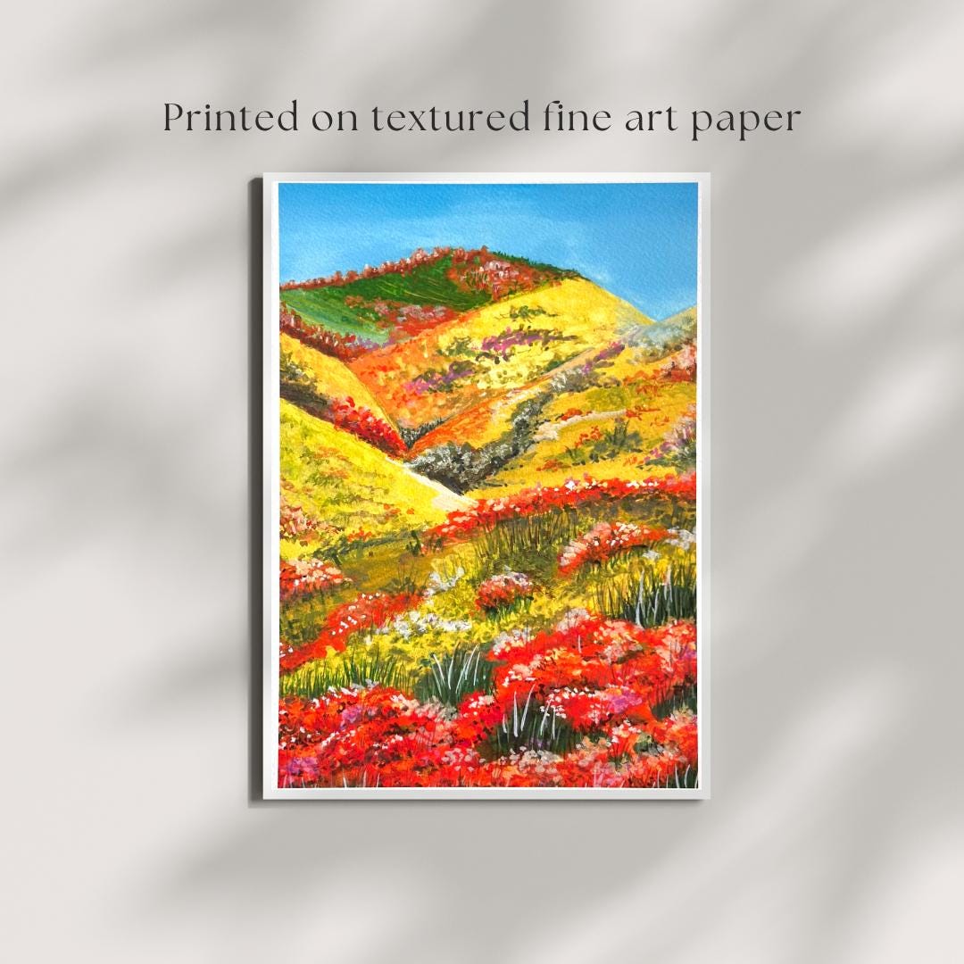 “The Blooming Path” gouache art print shown framed with text reading Printed on textured fine art paper — botanical garden path artwork by HerPens.