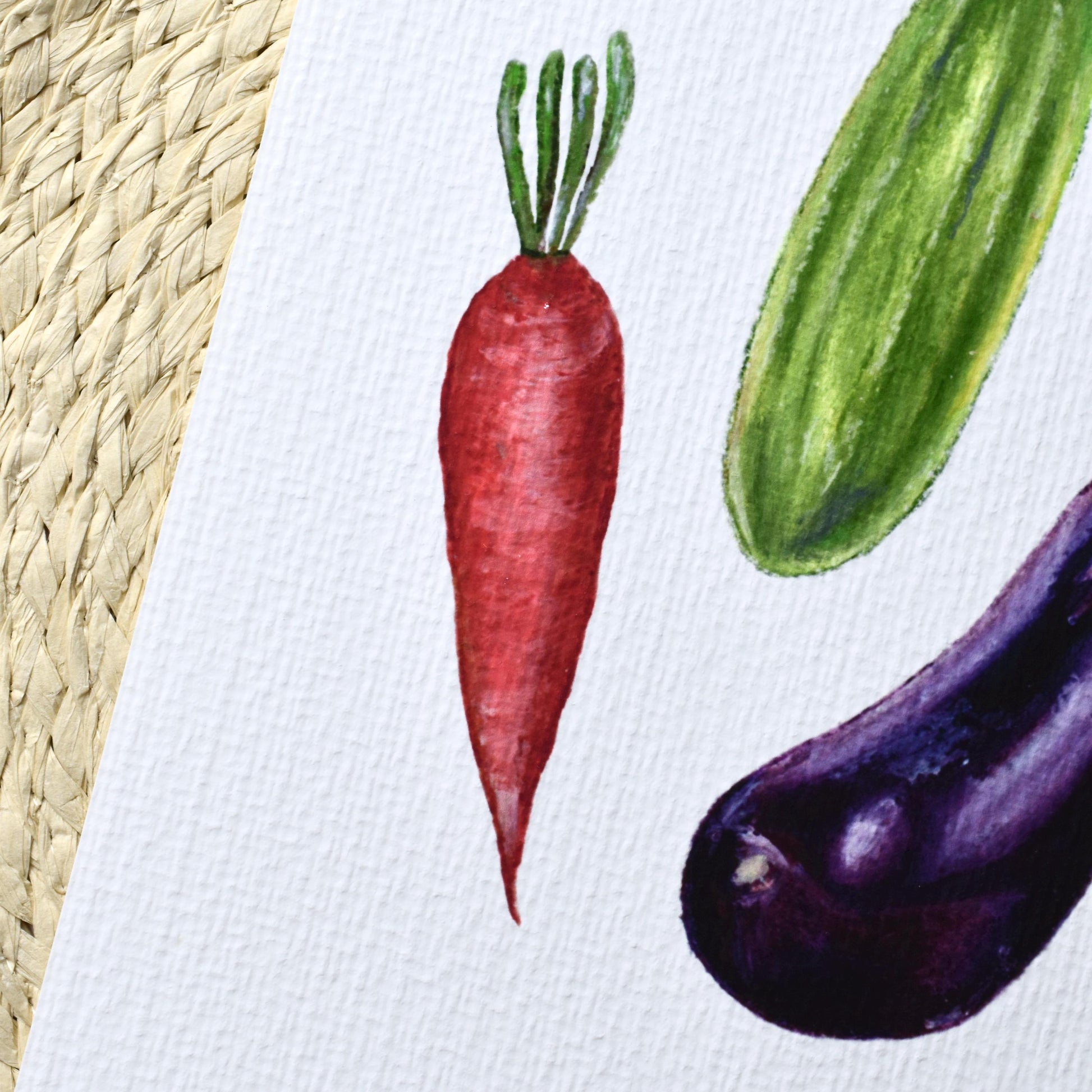 Side view of colourful vegetables art print highlighting paper thickness, matte texture and pastel layering, HerPens