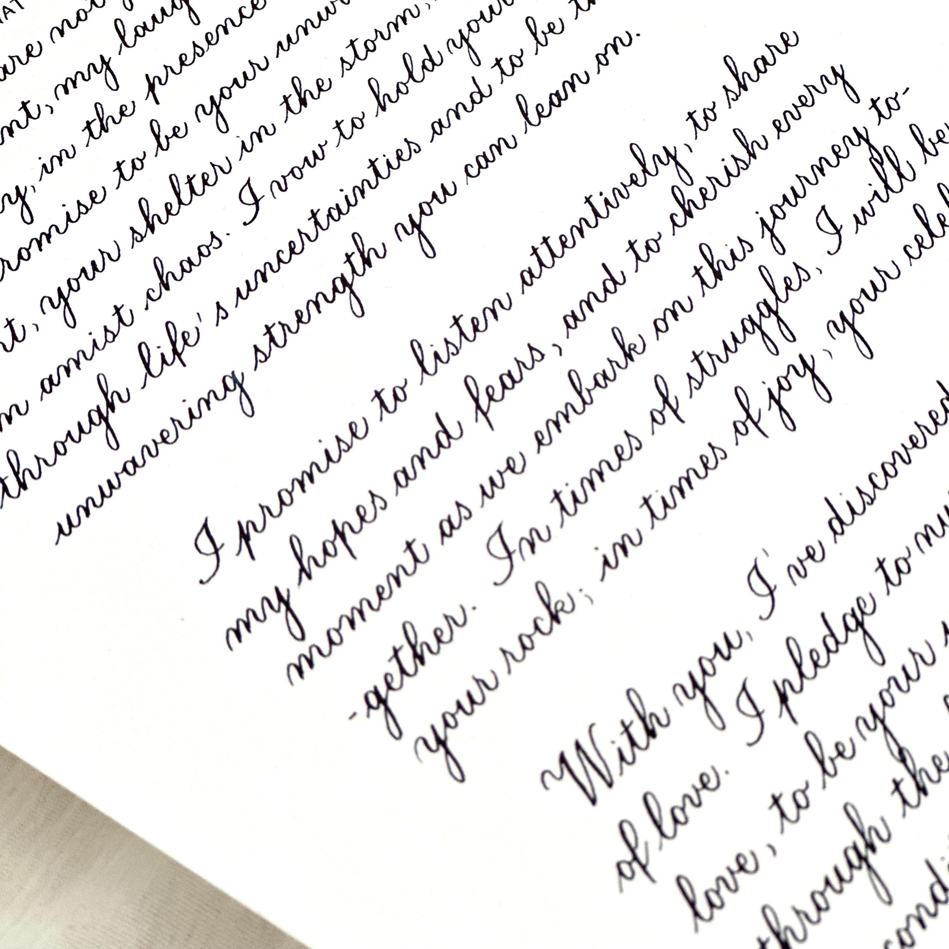Close up of copperplate calligraphy showing detailed elegant script in brown ink handwritten lettering herpens