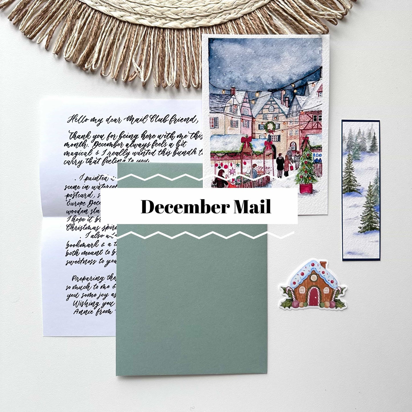 Collection of Christmas-themed stationery items including a card, envelope, and magnet on a white background.