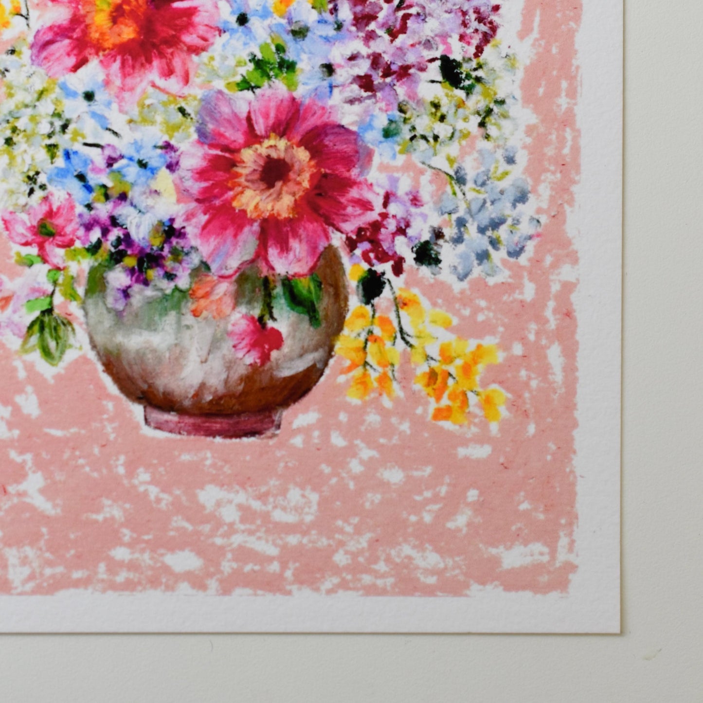 Close-up of vibrant oil pastel flowers showing soft texture and expressive strokes on textured fine art paper