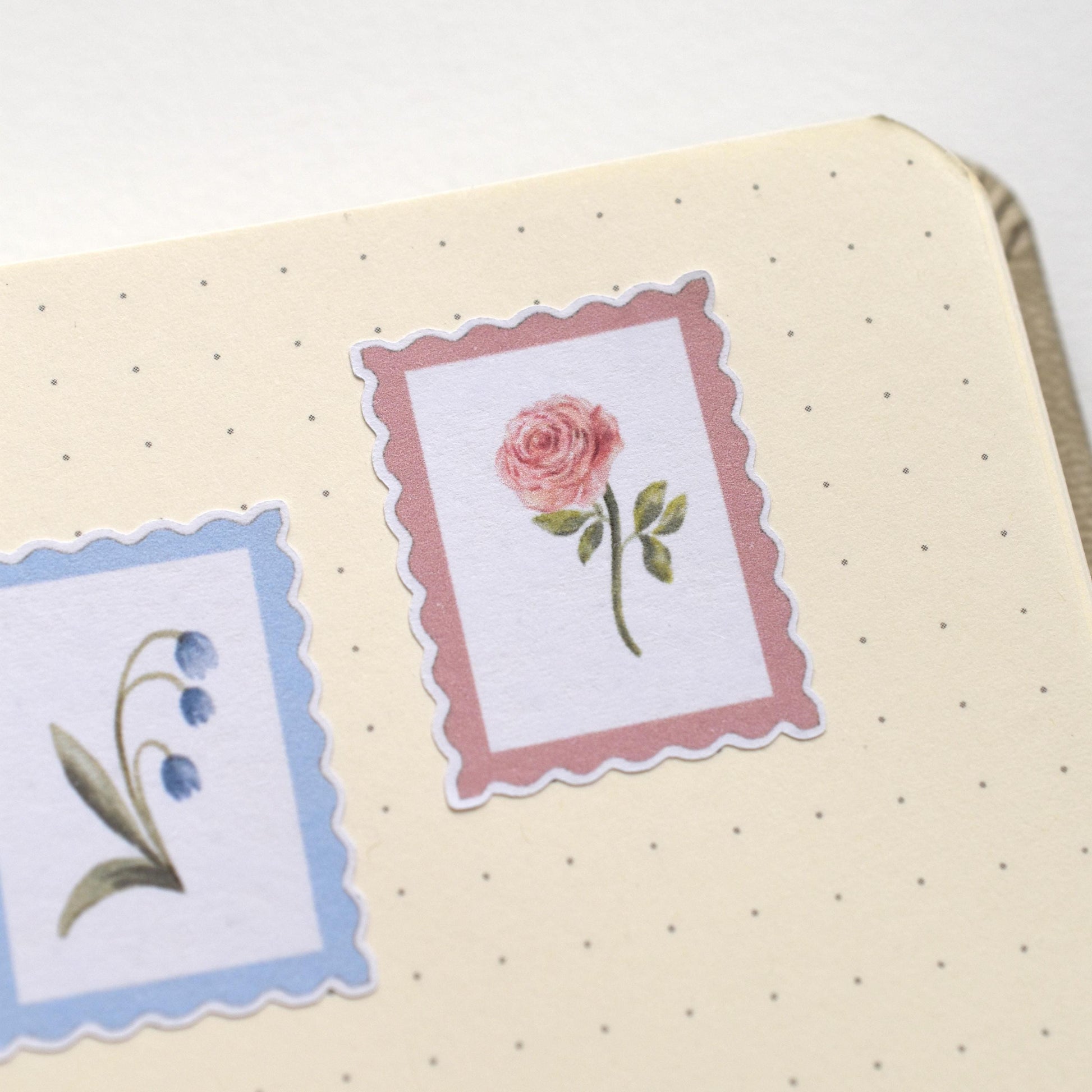 Decorative stickers with floral designs on a journal by herpens