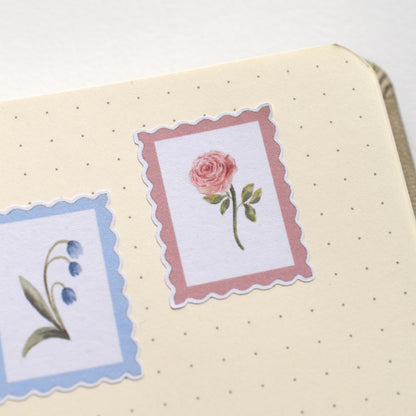 Decorative stickers with floral designs on a journal by herpens