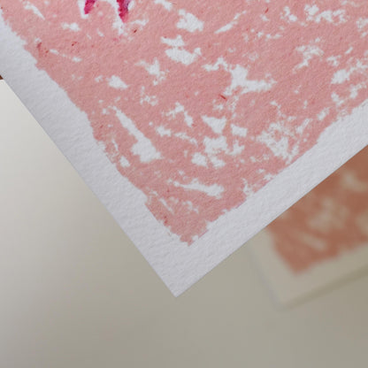 Detail of lower corner of floral oil pastel print, highlighting paper texture and soft pastel layering