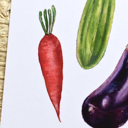 Illustration of a carrot, cucumber, and eggplant on a white background
