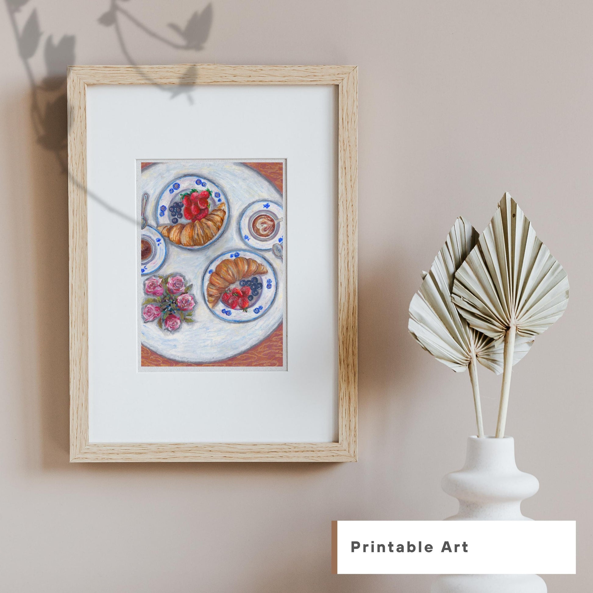 Oil pastel breakfast artwork framed against a neutral beige wall with vase decor, printable kitchen art for warm cozy interiors, HerPens