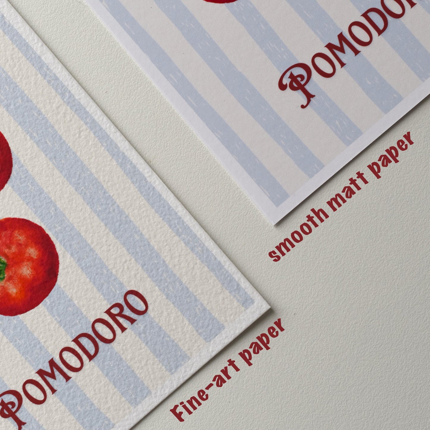 Side-by-side comparison of the “Pomodoro” tomato postcard on smooth matte paper and textured fine art paper, both labeled to show the two finish options from HerPens.