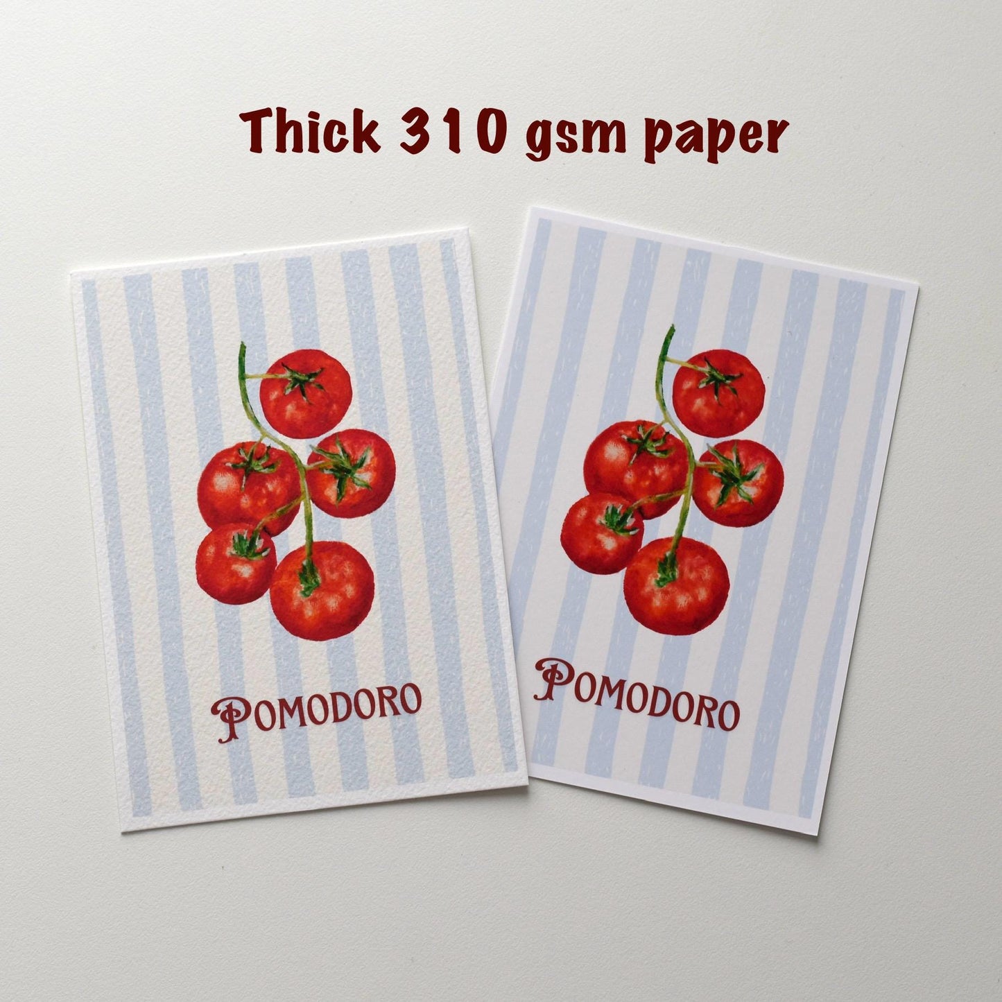 Side view of the “Pomodoro” postcard showing sturdy 310 gsm fine art paper thickness and quality printing by HerPens.