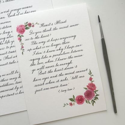 Romantic handwritten calligraphy love letter surrounded by colorful watercolor flowers