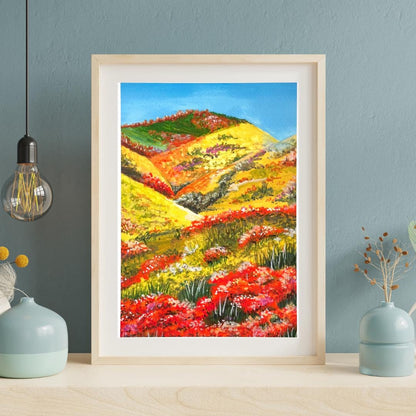 Framed “The Blooming Path” gouache print styled with soft florals — vibrant blooming garden scene for cozy home decor.