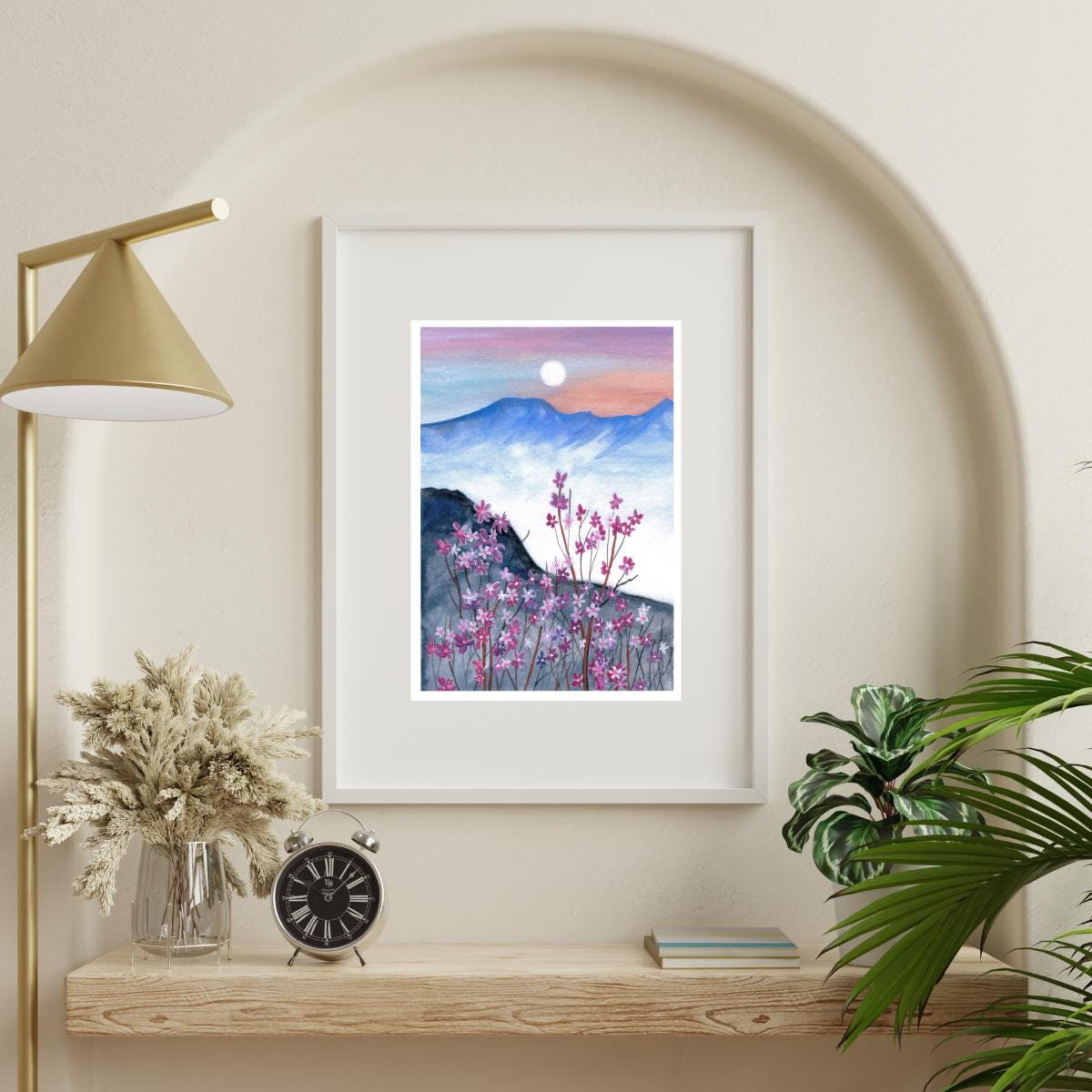 “Under the Moonlight” art print shown framed — dreamy moonlit landscape with flowers, ready to display in your home.