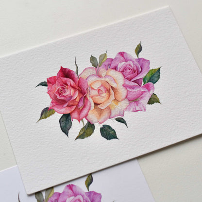 Watercolor roses postcard on textured fine art paper, painterly rose strokes and tactile paper surface visible, HerPens